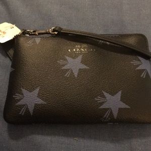 Coach wristlet black with blue stars
